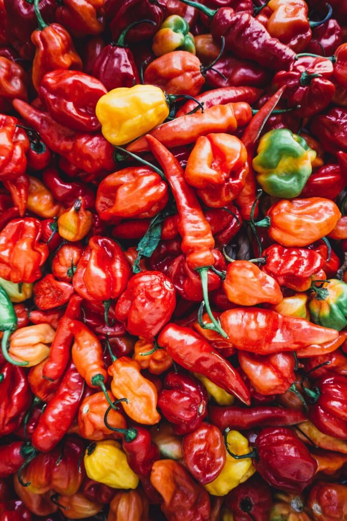 An assortment of peppers of all colors